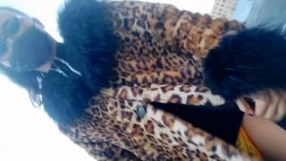 Asian Sissy Transgender Walking In The City In Leopard Coat