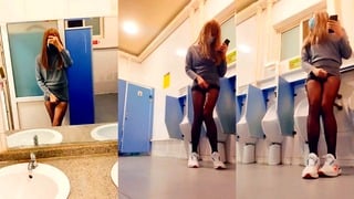 Chinese ladyboy cums on black stockings in public toilet