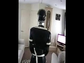 Slave rubber sissy doing chores